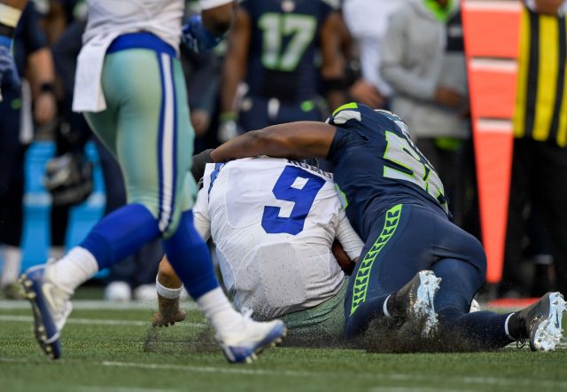 Tony Romo Injures Back, New York Giants Fans Look Ahead (Video)