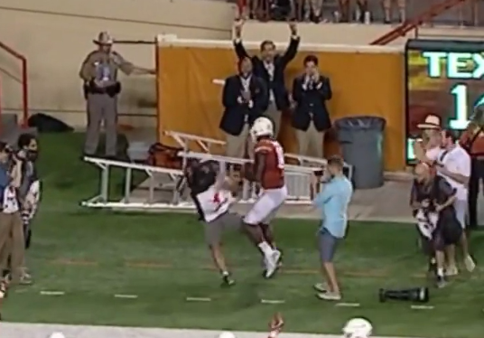 Texas QB Tyrone Swoopes Crashes Into Cameraman (Video)