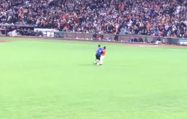 Angel Pagan Slams Running Fan To Outfield Ground (Video)