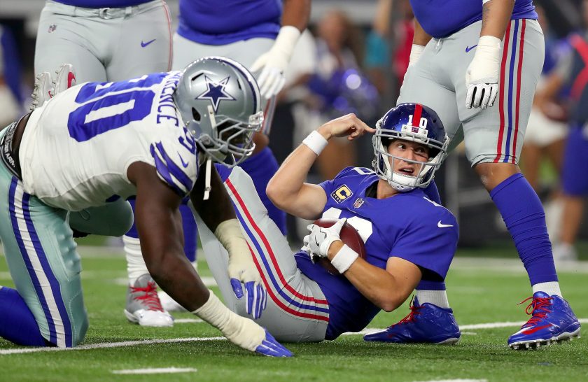 New York Giants QB Eli Manning gets trashed by Cowboys DE DeMarcus Lawrence