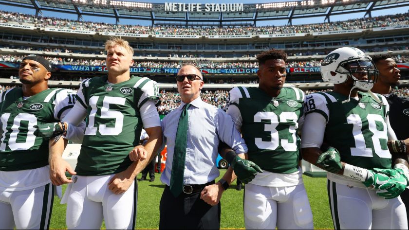 New York Jets CEO Chris Johnson doing pushups with the team