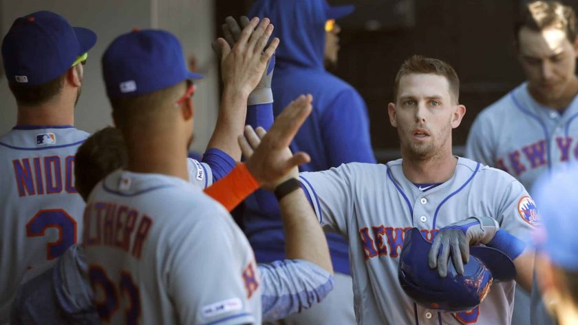 New York Mets’ Jeff McNeil makes leaping catch into netting in win (Video)
