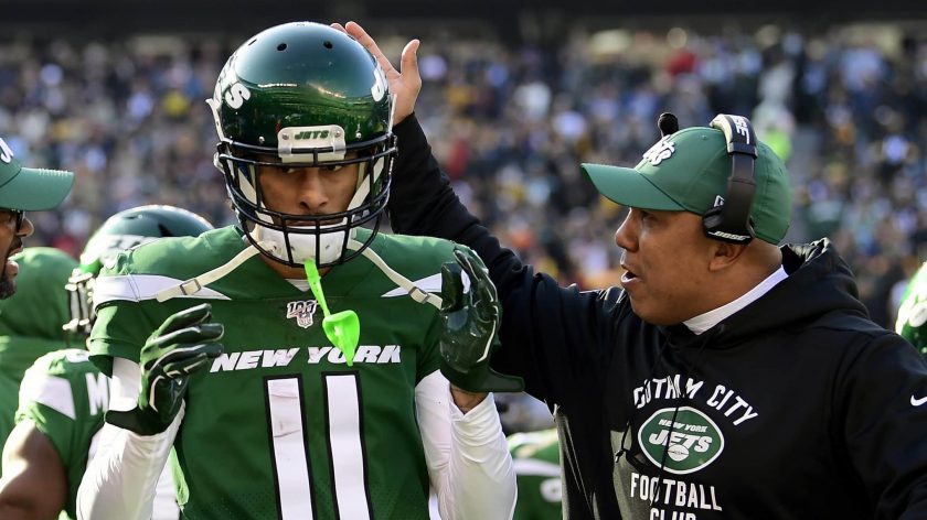 EAST RUTHERFORD, NEW JERSEY - DECEMBER 22: Robby Anderson #11 of the New York Jets is congratulated by assistant coach Hines Ward after a touchdown catch against the Pittsburgh Steelers during the first half at MetLife Stadium on December 22, 2019 in East Rutherford, New Jersey.