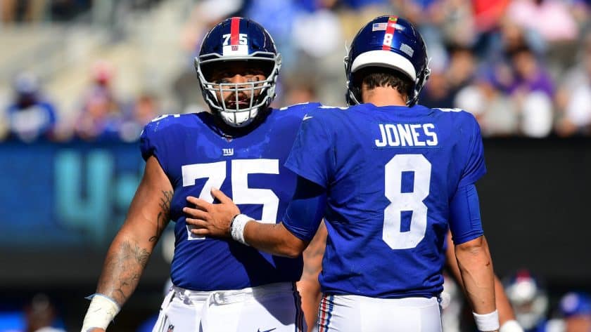 EAST RUTHERFORD, NEW JERSEY - SEPTEMBER 29: Daniel Jones #8 and Jon Halapio #75 of the New York Giants communicate during their game against the Washington Redskins at MetLife Stadium on September 29, 2019 in East Rutherford, New Jersey.
