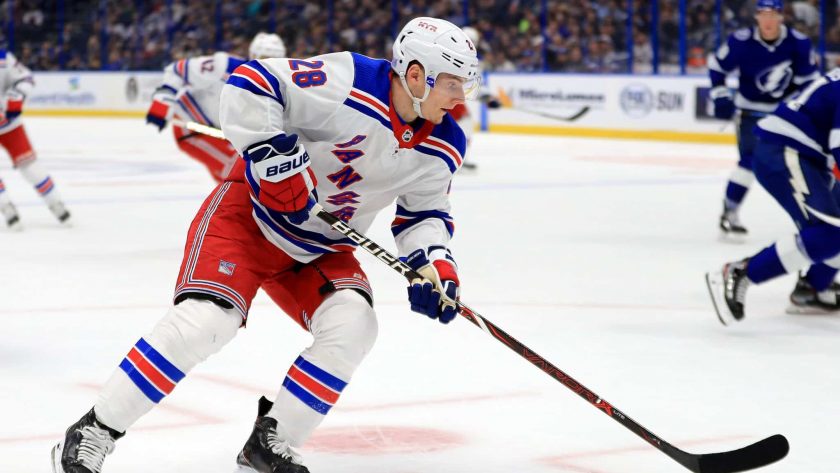 TAMPA, FLORIDA - NOVEMBER 14: Lias Andersson #28 of the New York Rangers skates with the puck during a game against the Tampa Bay Lightning at Amalie Arena on November 14, 2019 in Tampa, Florida.