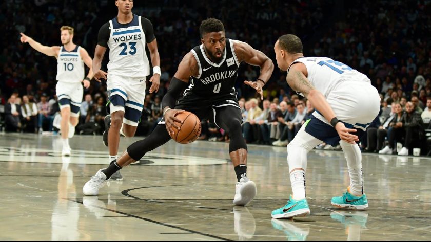 NEW YORK, NEW YORK - OCTOBER 23: Shabazz Napier #13 of the Minnesota Timberwolves guards David Nwaba #0 of the Brooklyn Nets as he controls the ball during the first half of their game at Barclays Center on October 23, 2019 in the Brooklyn borough of New York City. NOTE TO USER: User expressly acknowledges and agrees that, by downloading and or using this photograph, User is consenting to the terms and conditions of the Getty Images License Agreement.