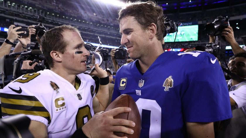 EAST RUTHERFORD, NEW JERSEY - SEPTEMBER 30: Drew Brees #9 of the New Orleans Saints and Eli Manning #10 of the New York Giants meet after their game at MetLife Stadium on September 30, 2018 in East Rutherford, New Jersey.