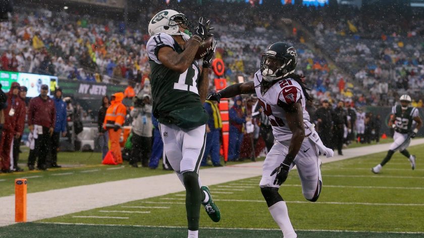 EAST RUTHERFORD, NJ - OCTOBER 29: Wide receiver Robby Anderson #11 of the New York Jets scores a touchdown against cornerback Desmond Trufant #21 of the Atlanta Falcons during the second quarter of the game at MetLife Stadium on October 29, 2017 in East Rutherford, New Jersey.