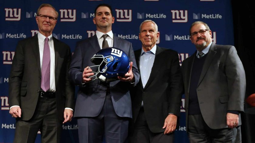 EAST RUTHERFORD, NJ - JANUARY 09: New York Giants new head coach Joe Judge, center, poses for photographs with team CEO John Mara, left, chairman and executive vice president Steve Tisch, and general manager Dave Gettleman, right, after a news conference at MetLife Stadium on January 9, 2020 in East Rutherford, New Jersey.