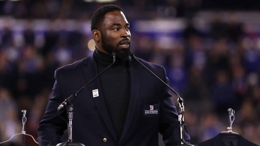 EAST RUTHERFORD, NJ - NOVEMBER 14: 2016 Giants Ring of Honor Inductee Justin Tuck speaks during the halftime ceremony of the game between the Cincinnati Bengals and the New York Giants at MetLife Stadium on November 14, 2016 in East Rutherford, New Jersey.