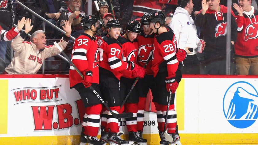 NEWARK, NEW JERSEY - FEBRUARY 20: Jesper Bratt #63 of the New Jersey Devils (C) celebrates his goal against Martin Jones #31 of the San Jose Sharks at 16:15 of the second period at the Prudential Center on February 20, 2020 in Newark, New Jersey.