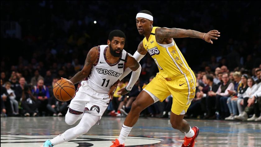 NEW YORK, NEW YORK - JANUARY 23: Kyrie Irving #11 of the Brooklyn Nets drives towards the basket against Kentavious Caldwell-Pope #1 of the Los Angeles Lakers at Barclays Center on January 23, 2020 in New York City. NOTE TO USER: User expressly acknowledges and agrees that, by downloading and or using this photograph, User is consenting to the terms and conditions of the Getty Images License Agreement.