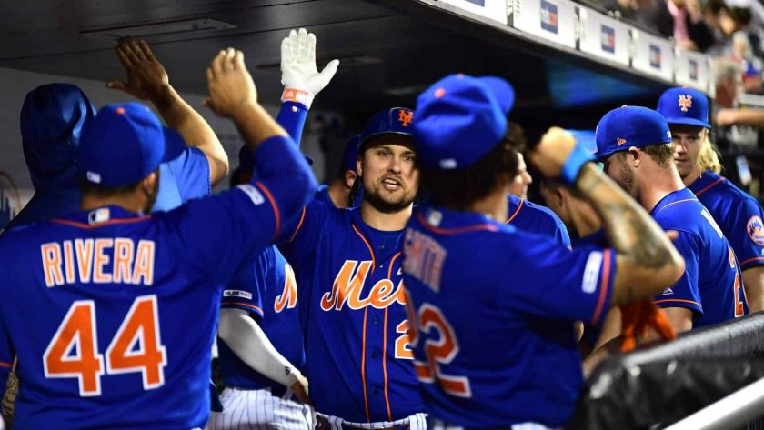 NEW YORK, NEW YORK - SEPTEMBER 27: J.D. Davis #28 of the New York Mets celebrates with teammates after his home run in the fourth inning of their game against the Atlanta Braves at Citi Field on September 27, 2019 in the Flushing neighborhood of the Queens borough of New York City.