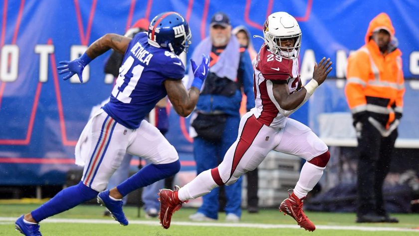 EAST RUTHERFORD, NEW JERSEY - OCTOBER 20: Antoine Bethea #41 of the New York Giants chases Chase Edmonds #29 of the Arizona Cardinals as he runs the ball for touchdown in the third quarter of their game at MetLife Stadium on October 20, 2019 in East Rutherford, New Jersey.