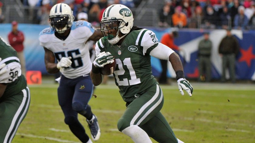 NASHVILLE, TN - DECEMBER 14: Chris Johnson #21 of the New York Jets rushes against the Tennessee Titans during the second half of a game at LP Field on December 14, 2014 in Nashville, Tennessee.