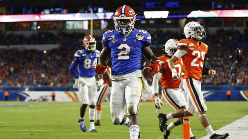 MIAMI, FLORIDA - DECEMBER 30: Lamical Perine #2 of the Florida Gators runs into the endzone for a touchdown against the Virginia Cavaliers during the first half of the Capital One Orange Bowl at Hard Rock Stadium on December 30, 2019 in Miami, Florida. New York Jets