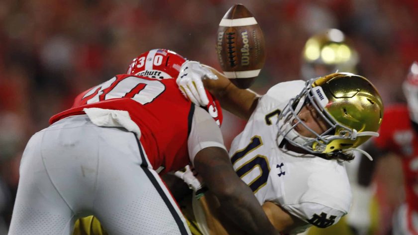 ATHENS, GEORGIA - SEPTEMBER 21: Chris Finke #10 of the Notre Dame Fighting Irish pulls in a first half catch next to Tae Crowder #30 of the Georgia Bulldogs at Sanford Stadium on September 21, 2019 in Athens, Georgia.