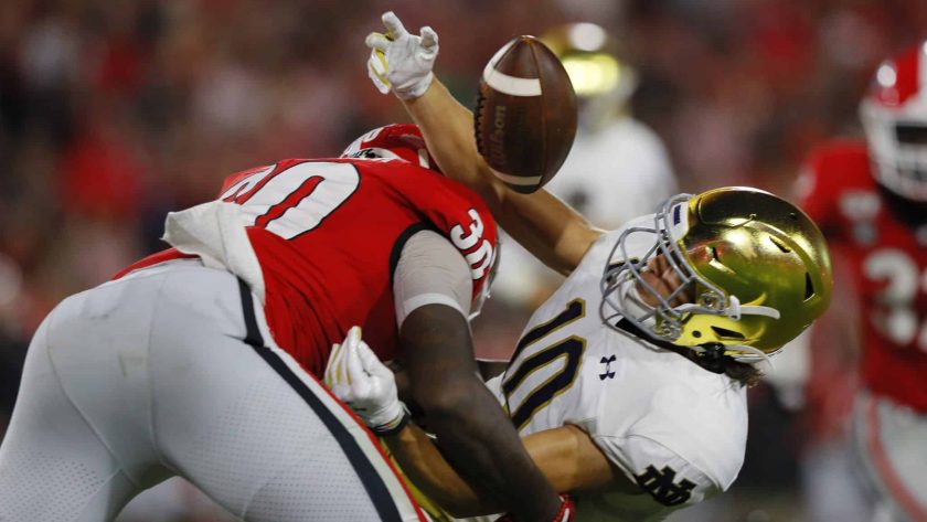 ATHENS, GEORGIA - SEPTEMBER 21: Chris Finke #10 of the Notre Dame Fighting Irish pulls in a first half catch next to Tae Crowder #30 of the Georgia Bulldogs at Sanford Stadium on September 21, 2019 in Athens, Georgia.