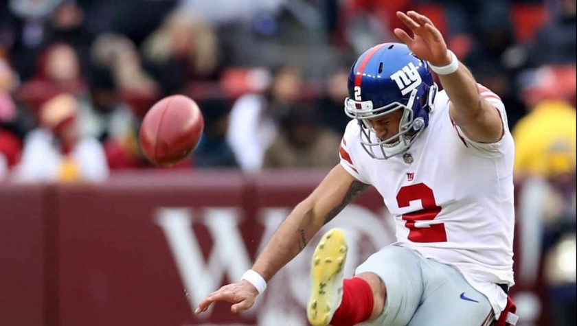 LANDOVER, MARYLAND - DECEMBER 09: Kicker Aldrick Rosas #2 of the New York Giants kicks off to the Washington Redskins at FedExField on December 09, 2018 in Landover, Maryland.