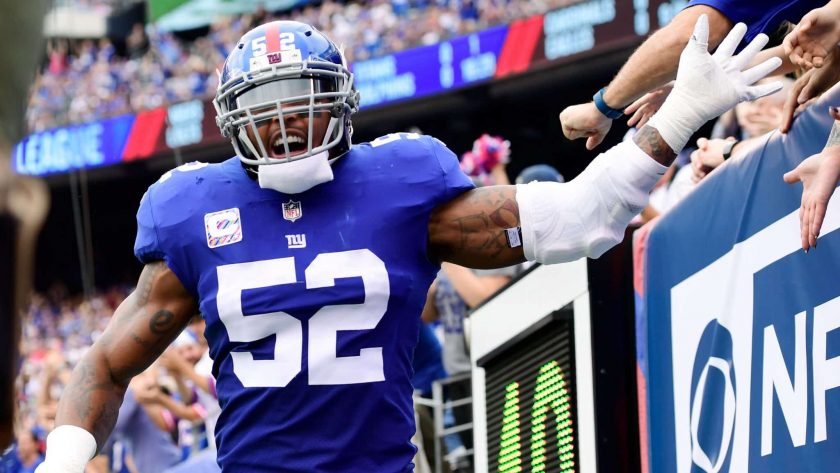EAST RUTHERFORD, NJ - OCTOBER 08: Jonathan Casillas #52 of the New York Giants celebrates after Philip Rivers #17 of the Los Angeles Chargers (not pictured) throws the ball out of the endzone for a safety in the first quarter during an NFL game at MetLife Stadium on October 8, 2017 in East Rutherford, New Jersey.