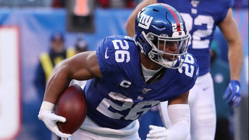 EAST RUTHERFORD, NEW JERSEY - DECEMBER 15: Saquon Barkley #26 of the New York Giants in action against the Miami Dolphins during their game at MetLife Stadium on December 15, 2019 in East Rutherford, New Jersey.