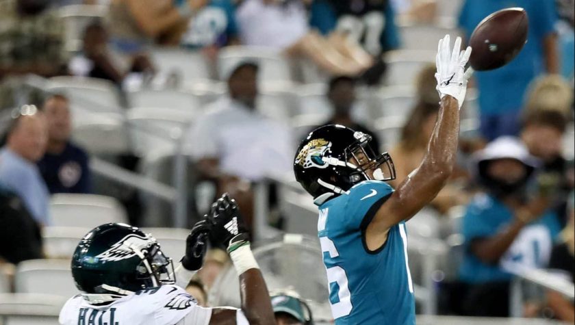 JACKSONVILLE, FLORIDA - AUGUST 15: C.J. Board #16 of the Jacksonville Jaguars catches a pass against Deiondre' Hall #36 of the Philadelphia Eagles in the second quarter during a preseason game at TIAA Bank Field on August 15, 2019 in Jacksonville, Florida.