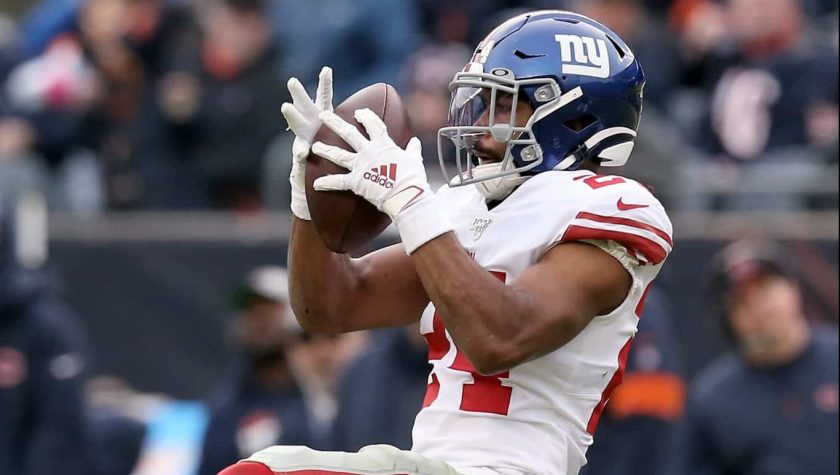 CHICAGO, ILLINOIS - NOVEMBER 24: Julian Love #24 of the New York Giants makes an interception in the fourth quarter against the Chicago Bears at Soldier Field on November 24, 2019 in Chicago, Illinois.