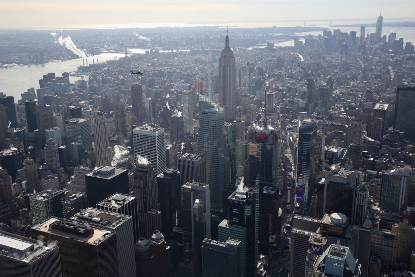 NEW YORK, NY - JANUARY 28: A Blackhawk helicopter flown by U.S. Customs and Border Protection (CBP), flies past the Empire State Building in Manhattan in route to the MetLife Stadium on January 28, 2014 in New York City. The CBP aircraft flown by "air interdiction agents" from the U.S. Office of Air and Marine (OAM), are providing air support for Super Bowl XLVIII this Sunday.