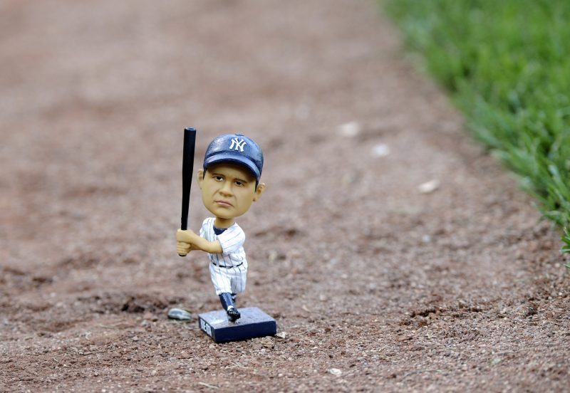 Sep 1, 2015; Boston, MA, USA; A bobble head doll of Babe Ruth on the field prior to a game between the Boston Red Sox and New York Yankees at Fenway Park. Mandatory Credit: Bob DeChiara-USA TODAY Sports