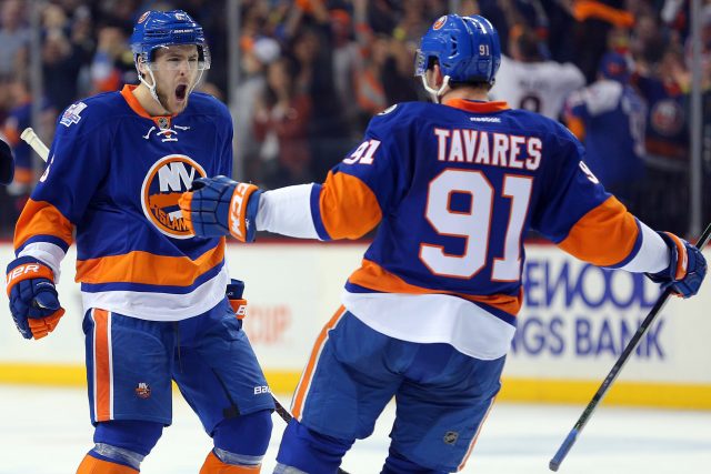 Apr 17, 2016; Brooklyn, NY, USA; New York Islanders defenseman Ryan Pulock (6) celebrates his goal against the Florida Panthers with New York Islanders center John Tavares (91) during the second period of game three of the first round of the 2016 Stanley Cup Playoffs at Barclays Center. Mandatory Credit: Brad Penner-USA TODAY Sports