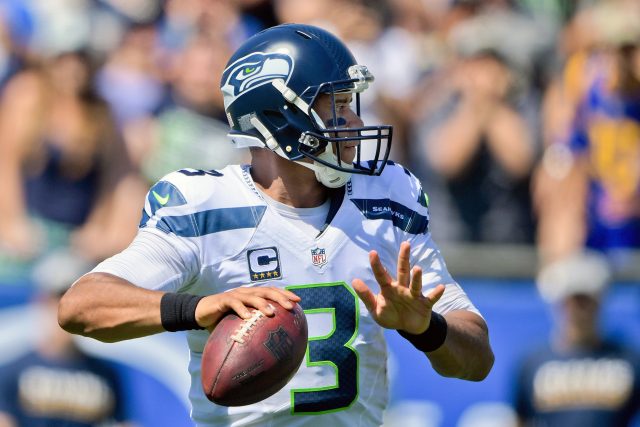 Sep 18, 2016; Los Angeles, CA, USA; Seattle Seahawks quarterback Russell Wilson (3) looks to pass against the Los Angeles Rams during the second half of a NFL game at Los Angeles Memorial Coliseum. Mandatory Credit: Kirby Lee-USA TODAY Sports