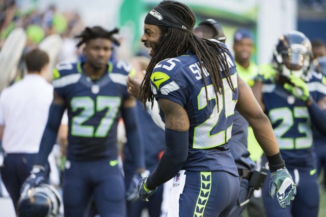 Sep 25, 2016; Seattle, WA, USA; Seattle Seahawks cornerback Richard Sherman (25) dances on the sidelines during the third quarter during a game against the San Francisco 49ers at CenturyLink Field. The Seahawks won 37-18. Mandatory Credit: Troy Wayrynen-USA TODAY Sports
