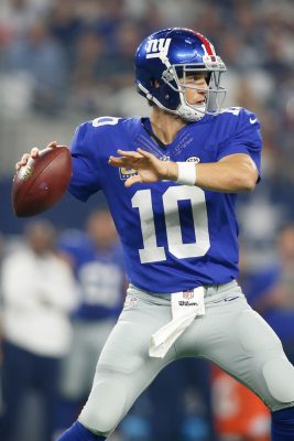 Sep 13, 2015; Arlington, TX, USA; New York Giants quarterback Eli Manning (10) throws a pass in the game against the Dallas Cowboys at AT&T Stadium. Dallas won 27-26. Mandatory Credit: Tim Heitman-USA TODAY Sports