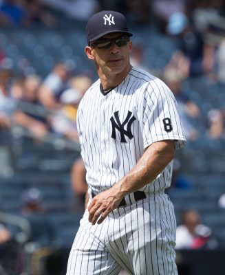 Aug 14, 2016; Bronx, NY, USA; New York Yankees manager Joe Girardi (28) in a game against the Tampa Bay Rays at Yankee Stadium. The Tampa Bay Rays won 12-3. Mandatory Credit: Bill Streicher-USA TODAY Sports