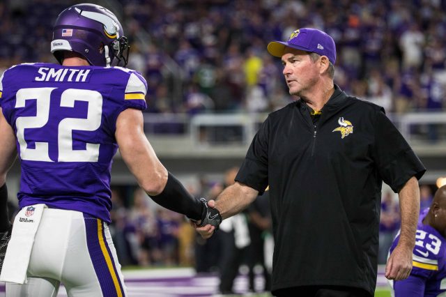 Sep 18, 2016; Minneapolis, MN, USA; Minnesota Vikings head coach Mike Zimmer and safety Harrison Smith (22) against the Green Bay Packers at U.S. Bank Stadium. The Vikings defeated the Packers 17-14. Mandatory Credit: Brace Hemmelgarn-USA TODAY Sports