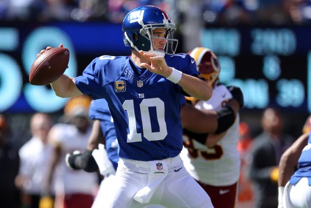 Sep 25, 2016; East Rutherford, NJ, USA; New York Giants quarterback Eli Manning (10) drops back to pass against the Washington Redskins during the second quarter at MetLife Stadium. Mandatory Credit: Brad Penner-USA TODAY Sports