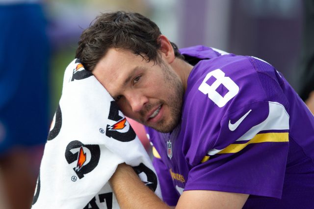 Sep 25, 2016; Charlotte, NC, USA; Minnesota Vikings quarterback Sam Bradford (8) sits on the bench in the fourth quarter against the Carolina Panthers at Bank of America Stadium. The Vikings defeated the Panthers 22-10. Mandatory Credit: Jeremy Brevard-USA TODAY Sports