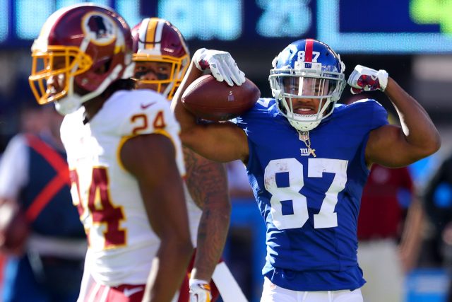 Sep 25, 2016; East Rutherford, NJ, USA; New York Giants wide receiver Sterling Shepard (87) reacts after being hit by Washington Redskins corner back Josh Norman (24) during the fourth quarter at MetLife Stadium. Mandatory Credit: Brad Penner-USA TODAY Sports