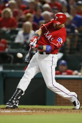 Sep 30, 2016; Arlington, TX, USA; Texas Rangers designated hitter Carlos Beltran (36) hits a home run in the third inning against the Tampa Bay Rays at Globe Life Park in Arlington. Mandatory Credit: Tim Heitman-USA TODAY Sports