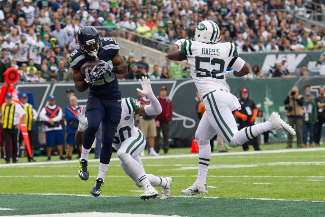 Oct 2, 2016; East Rutherford, NJ, USA; Seattle Seahawks running back C.J. Spiller (28) catches a ball for a touchdown against the New York Jets in the first half at MetLife Stadium. Mandatory Credit: William Hauser-USA TODAY Sports