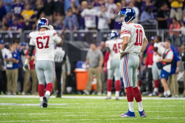 Oct 3, 2016; Minneapolis, MN, USA; New York Giants quarterback Eli Manning (10) reacts after a failed fourth down conversion during the fourth quarter against the Minnesota Vikings at U.S. Bank Stadium. The Vikings defeated the Giants 24-10. Mandatory Credit: Brace Hemmelgarn-USA TODAY Sports