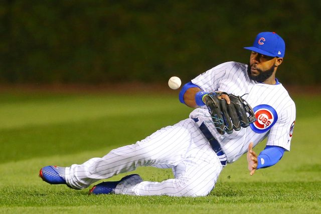 Oct 8, 2016; Chicago, IL, USA; Chicago Cubs right fielder Jason Heyward (22) is unable to field a ball hit by San Francisco Giants right fielder Hunter Pence (not pictured) during the second inning during game two of the 2016 NLDS playoff baseball series at Wrigley Field. Mandatory Credit: Dennis Wierzbicki-USA TODAY Sports