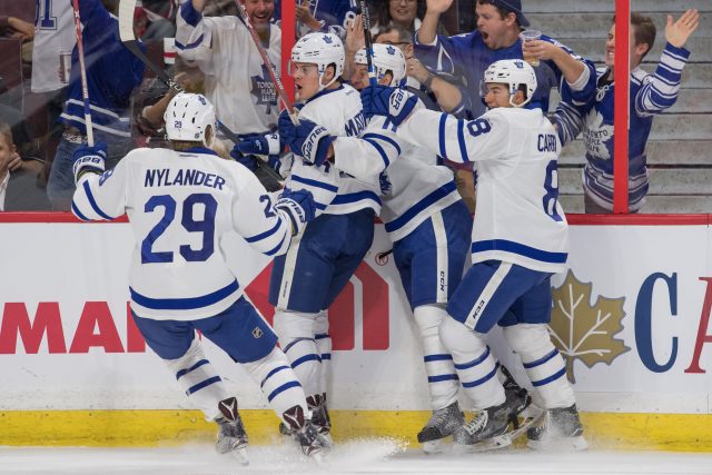 Oct 12, 2016; Ottawa, Ontario, CAN; Toronto Maple Leafs ccenter Auston Matthews celebrates his first NHL goal in the first period against the Ottawa Senators  at Canadian Tire Centre. Mandatory Credit: Marc DesRosiers-USA TODAY Sports