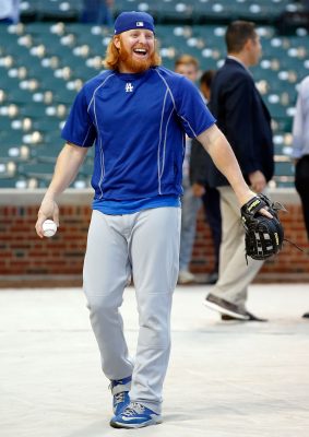 Oct 15, 2016; Chicago, IL, USA; Los Angeles Dodgers third baseman Justin Turner (10) laughs during warmups before game one of the 2016 NLCS playoff baseball series at Wrigley Field. Mandatory Credit: