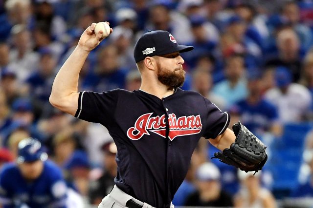 Oct 18, 2016; Toronto, Ontario, CAN; Cleveland Indians starting pitcher Corey Kluber (28) throws a pitch during the first inning against the Toronto Blue Jays in game four of the 2016 ALCS playoff baseball series at Rogers Centre. Mandatory Credit: Nick Turchiaro-USA TODAY Sports