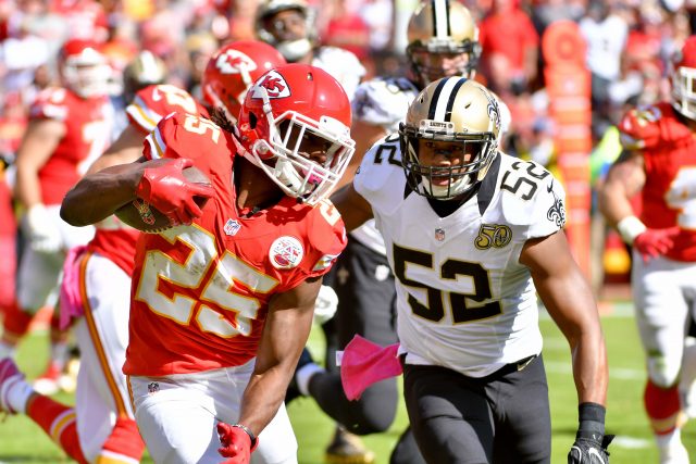 Oct 23, 2016; Kansas City, MO, USA; Kansas City Chiefs running back Jamaal Charles (25) runs the ball as New Orleans Saints outside linebacker Craig Robertson (52) defends during the first half at Arrowhead Stadium. Mandatory Credit: Denny Medley-USA TODAY Sports