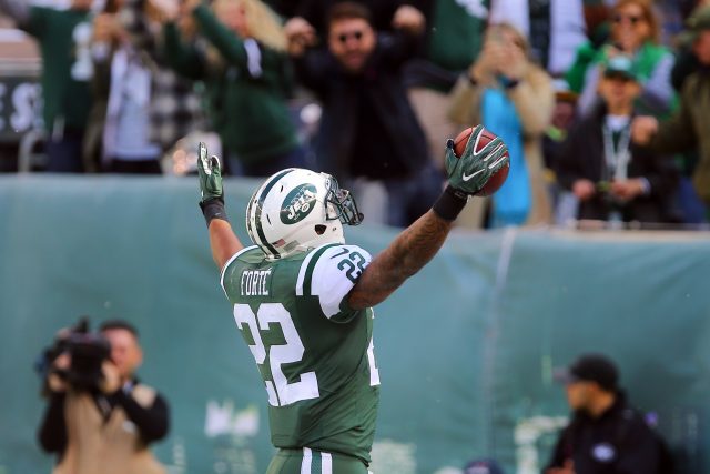 Oct 23, 2016; East Rutherford, NJ, USA; New York Jets running back Matt Forte (22) celebrates his touchdown catch during the first half of their game against the Baltimore Ravens at MetLife Stadium. Mandatory Credit: Ed Mulholland-USA TODAY Sports