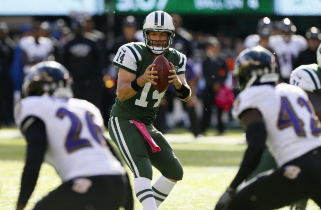 Oct 23, 2016; East Rutherford, NJ, USA; New York Jets quarterback Ryan Fitzpatrick (14) drops back to pass against Baltimore Ravens during second half at MetLife Stadium. The New York Jets defeated the Baltimore Ravens 24-16. Mandatory Credit: Noah K. Murray-USA TODAY Sports