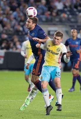 Oct 23, 2016; New York, NY, USA;  New York City FC midfielder Frank Lampard (8) heads a ball over Columbus Crew midfielder Will Trapp (20) during the second half at Yankee Stadium. New York City FC won 4-1.  Mandatory Credit: Vincent Carchietta-USA TODAY Sports