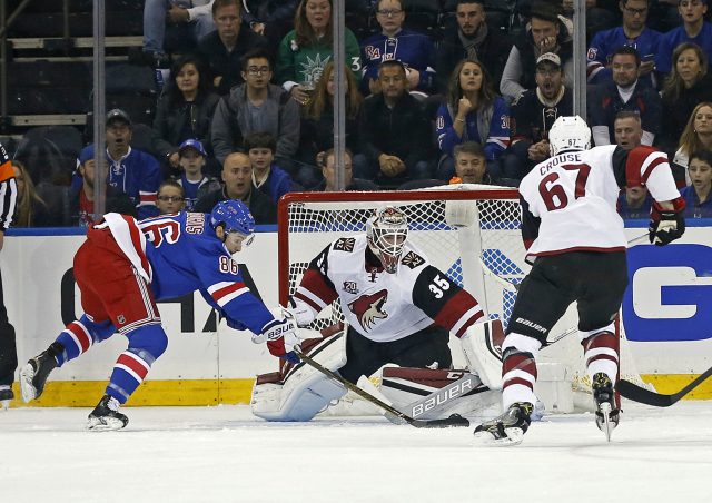 Oct 23, 2016; New York, NY, USA; New York Rangers right wing Josh Jooris (86) scores a goal past Arizona Coyotes goalie Louis Domingue (35) during the first period at Madison Square Garden. Mandatory Credit: Adam Hunger-USA TODAY Sports